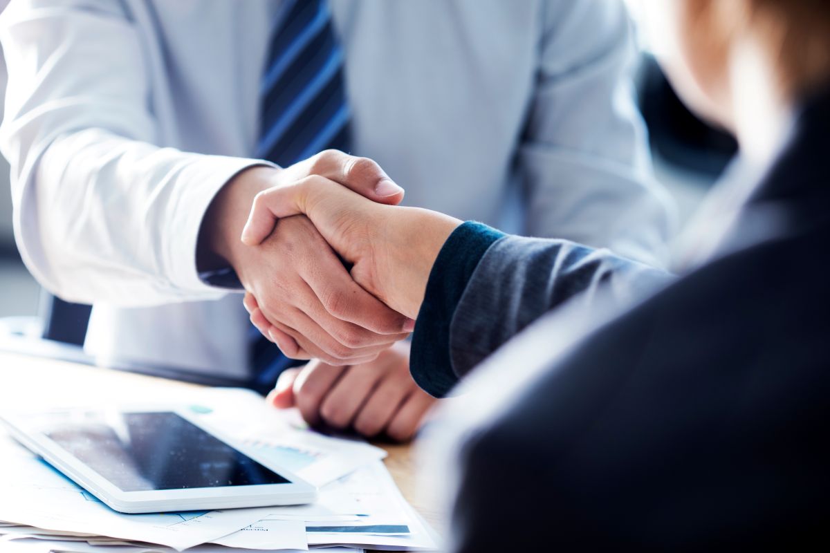 Business handshake in the office, Wayzata