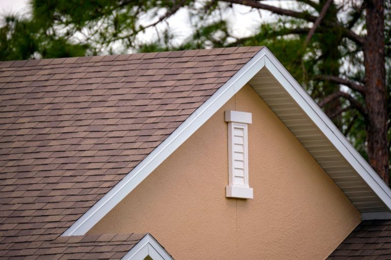 Closeup of house roof top covered with asphalt shingles, Wayzata, Minnesota
