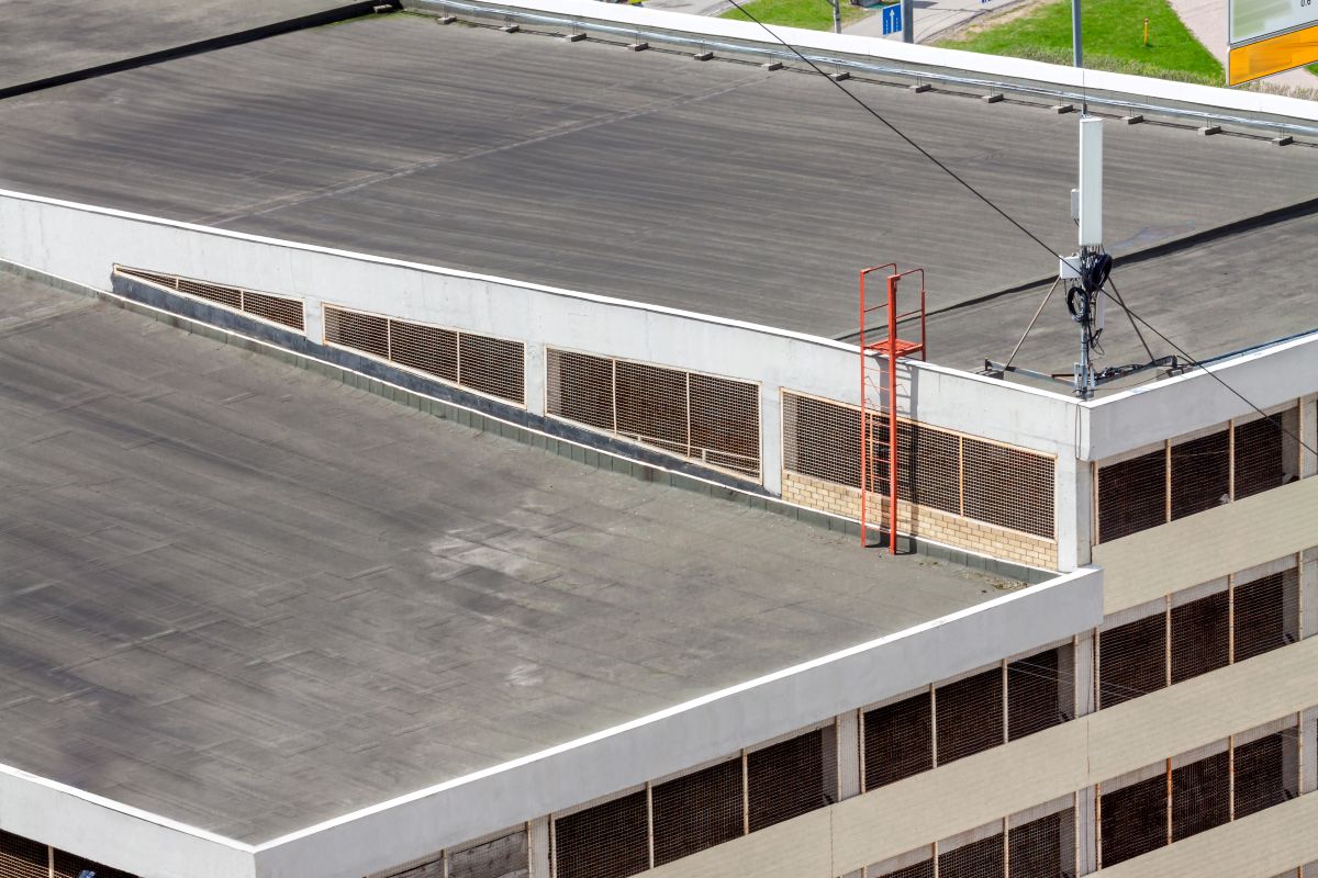 Flat roof top modern commercial building car garage exterior mixed-use urban multi-family residential area, Wayzata