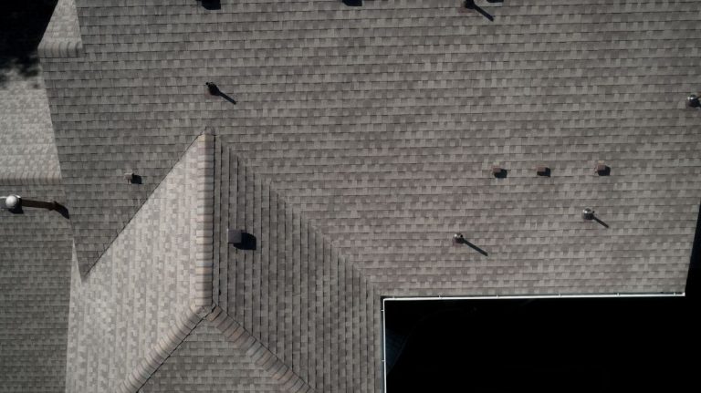 Top of a homeowners of a residence roof shingles, Wayzata, MN