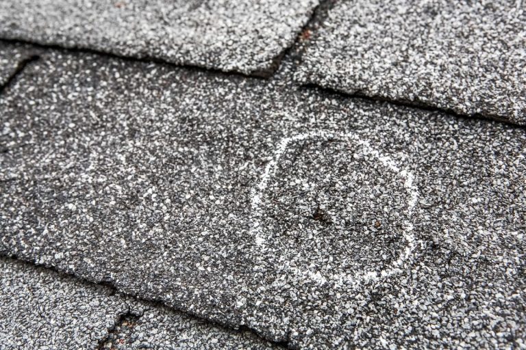 close-up view of shingle damage after hail storm, Wayzata, Minnesota